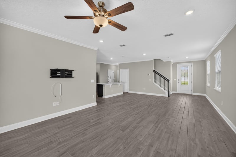 Living room with wall-mounted TV bracket at 331 Millerstone Dr, St. Augustine, FL 32092