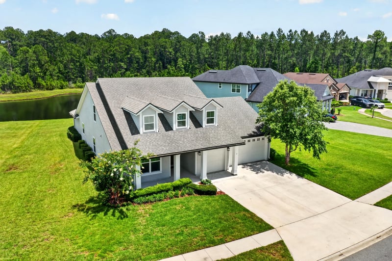 Side angle of front exterior showing dormer roofline at 53 Lumen Ct, St. Augustine, FL 32095