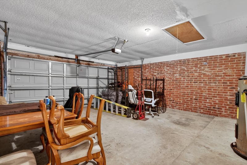 Garage interior with brick walls at 2164 Orangewood St, Middleburg, FL 32068