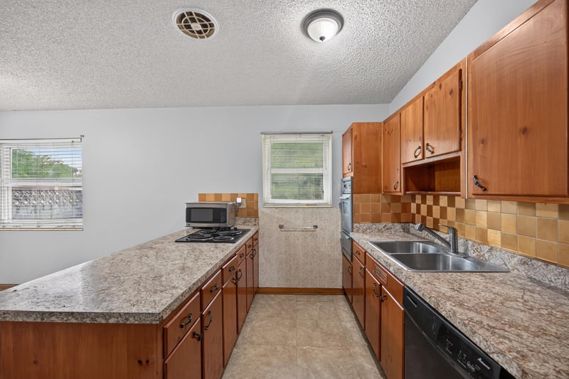 Kitchen counter and sink with window at 11462 Elane Dr, Jacksonville, FL