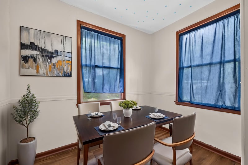 Dining area staged with table and wall art at 2132 Allandale Cir W, Jacksonville, FL