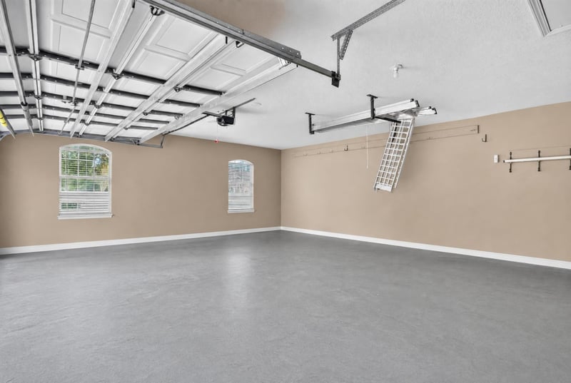 Garage with epoxy-style flooring at 2304 Spring Hill Ct, Orange Park, FL