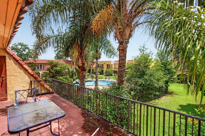 Patio table with view of community pool at 3866 Campenero Ct unit 6, Jacksonville, FL 32217