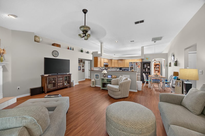 Wide view of living room open to kitchen at 13514 Las Brisas Way N, Jacksonville, FL