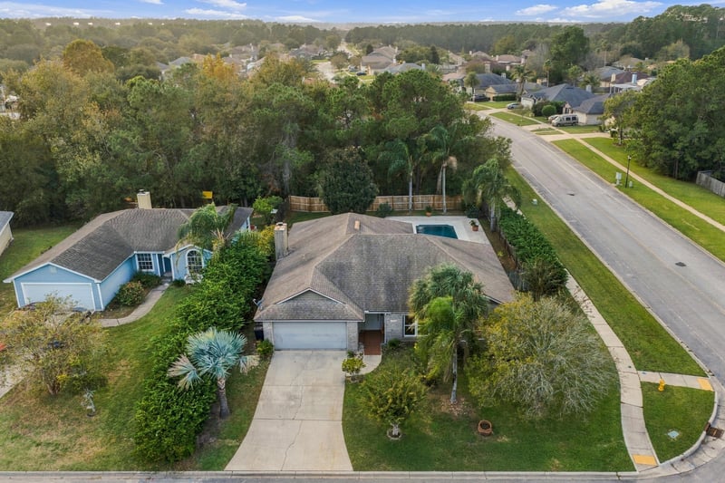 Aerial view of the home and street, photographed by Megapixeler on Winding Springs Ct, Jacksonville