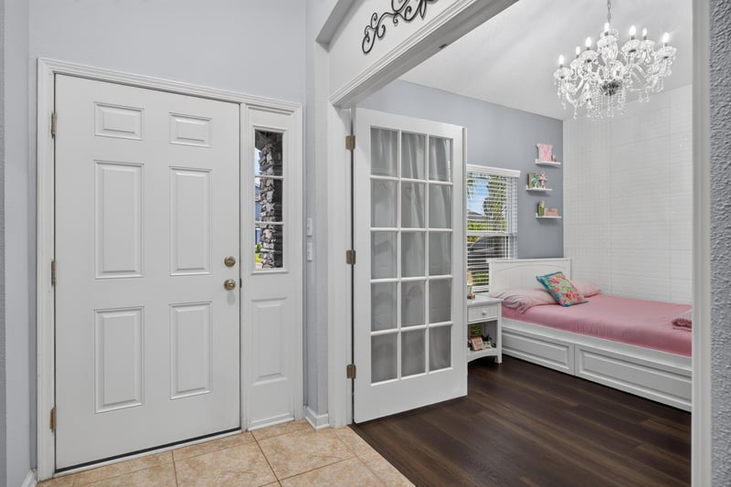 Entry foyer with tile floor and front door at 538 Porta Rosa Circle, St. Augustine, FL 32092