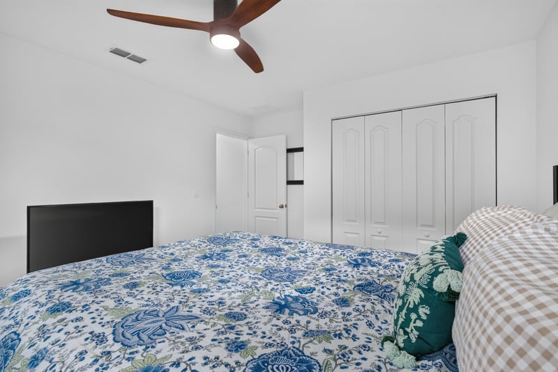 Bedroom with carpet and closet doors at 4276 Quaking St, Jacksonville, FL 32218