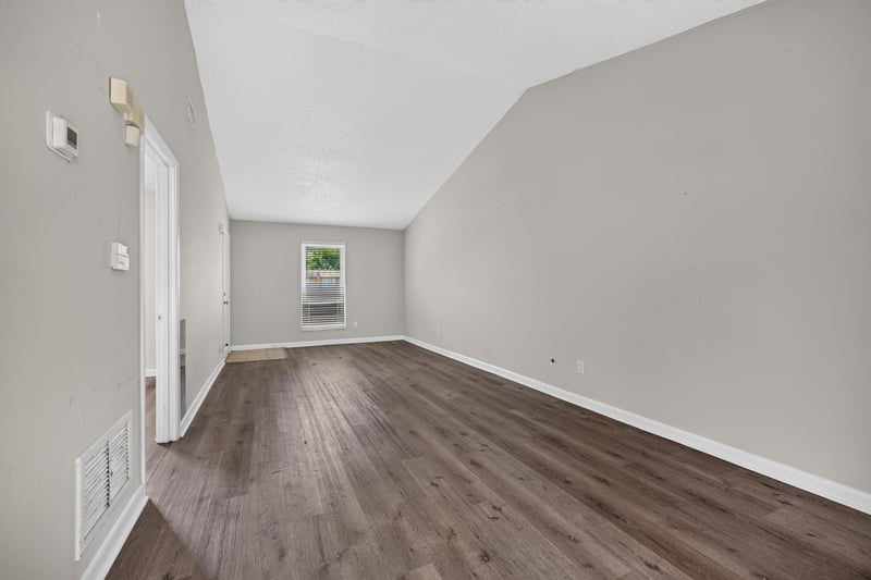 Bedroom corner with window at 2719 Trollie Ln