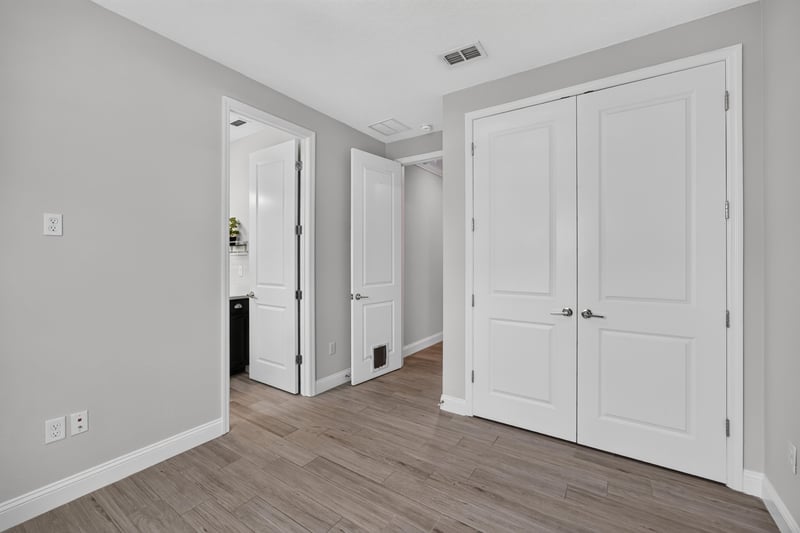 Hallway with linen closet at 91 Tilloo Ct, St. Johns, FL
