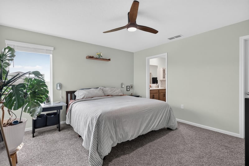 Bedroom with ceiling fan and carpet at 4276 Quaking St, Jacksonville, FL 32218