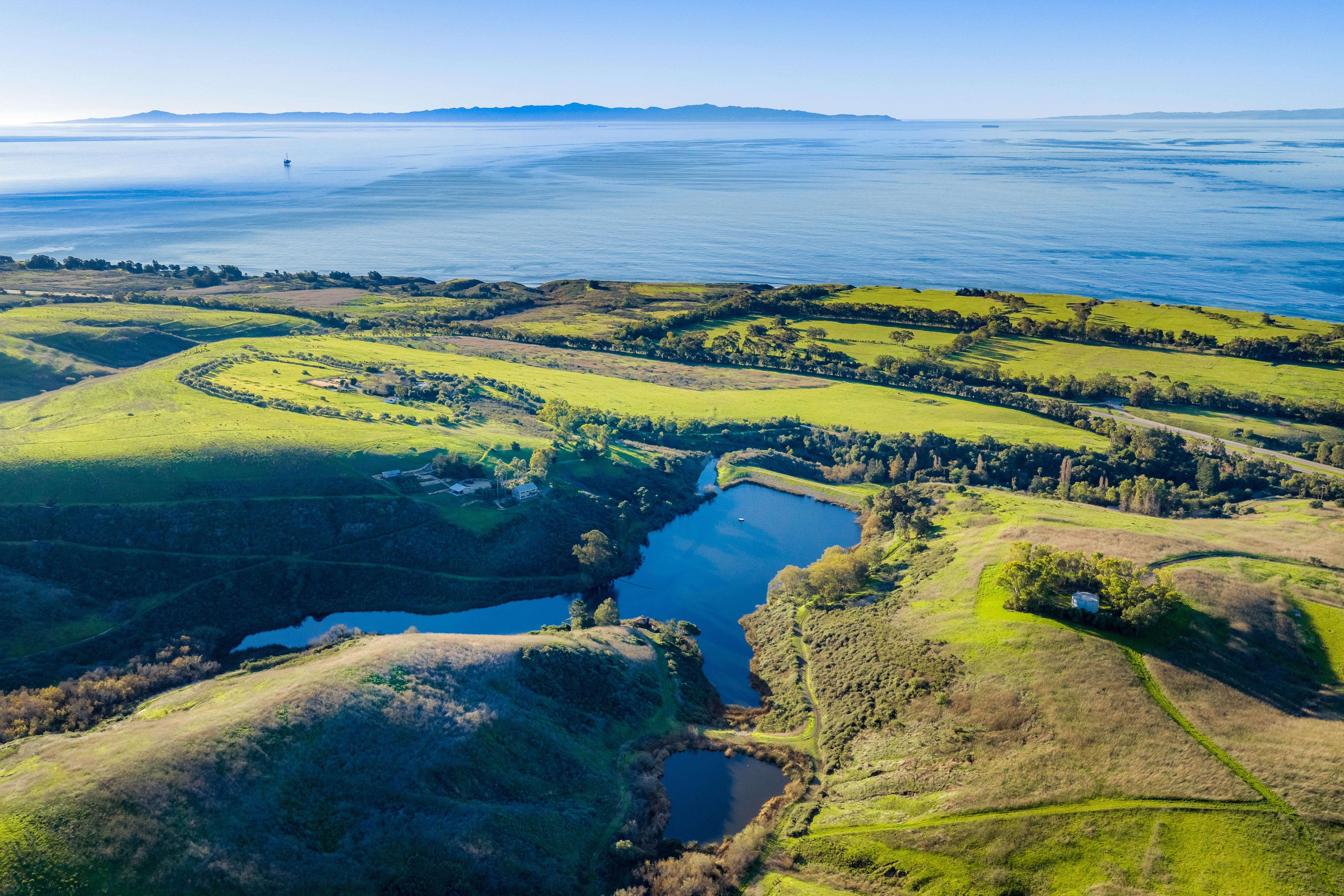 Aerial drone photography of Naples Access Rd, Goleta with Pacific Ocean and Channel Islands backdrop — VirTour Media Southern California
