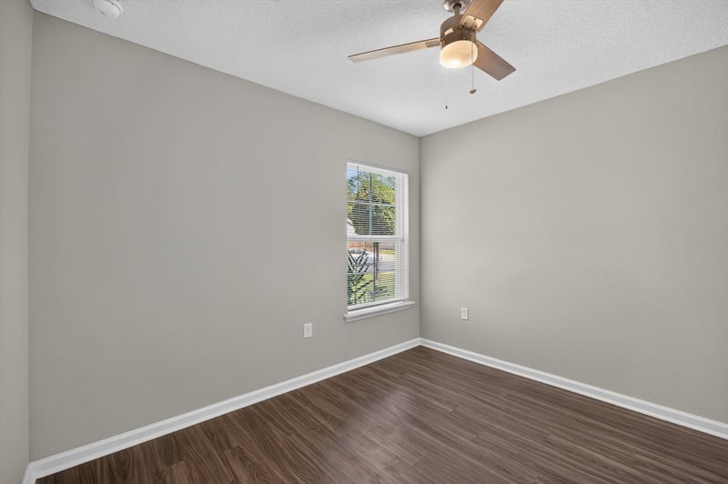 Bedroom with window at 7118 Preston Pnes Trl, Jacksonville, FL