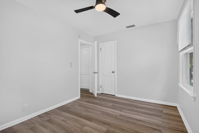Bedroom with ceiling light and closet door at 855 Cornwallis Dr, Jacksonville, FL