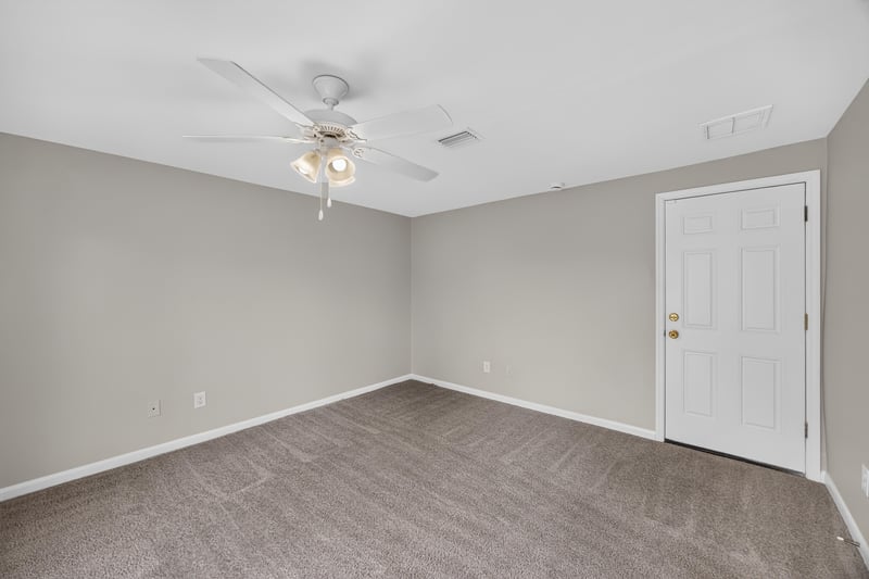 Room with carpet and white doors at 1143 Tumbleweed Dr, Orange Park, FL 32065