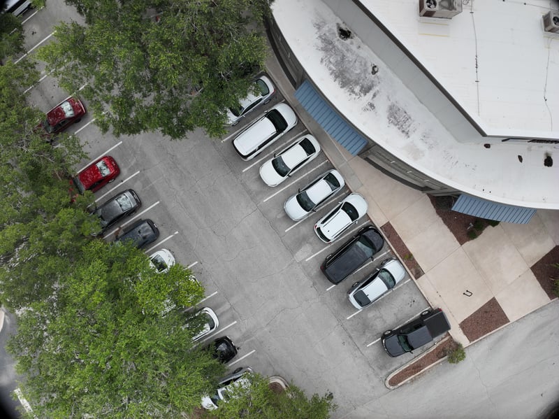 Aerial view of curved walkway and parking rows at 9406 Atlantic Blvd, Jacksonville, FL 32225