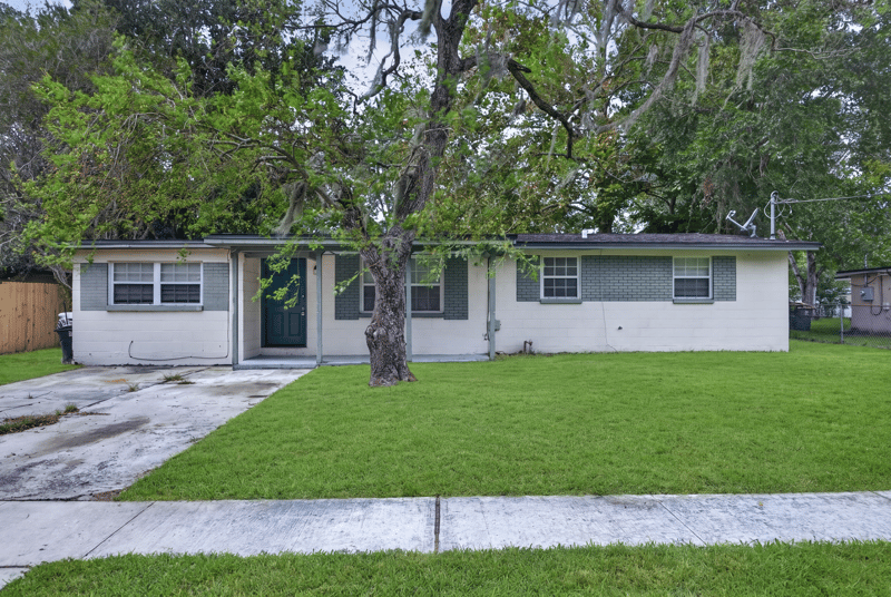 Front exterior with driveway at 5812 Tampico Rd, Jacksonville, FL 32244
