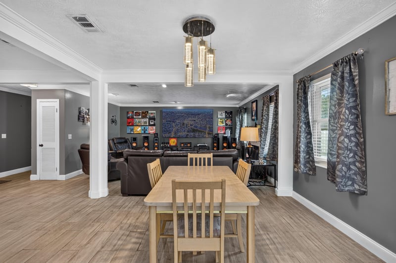 Dining area with table opening to kitchen at 6059 Karen St, Jacksonville, FL 32244