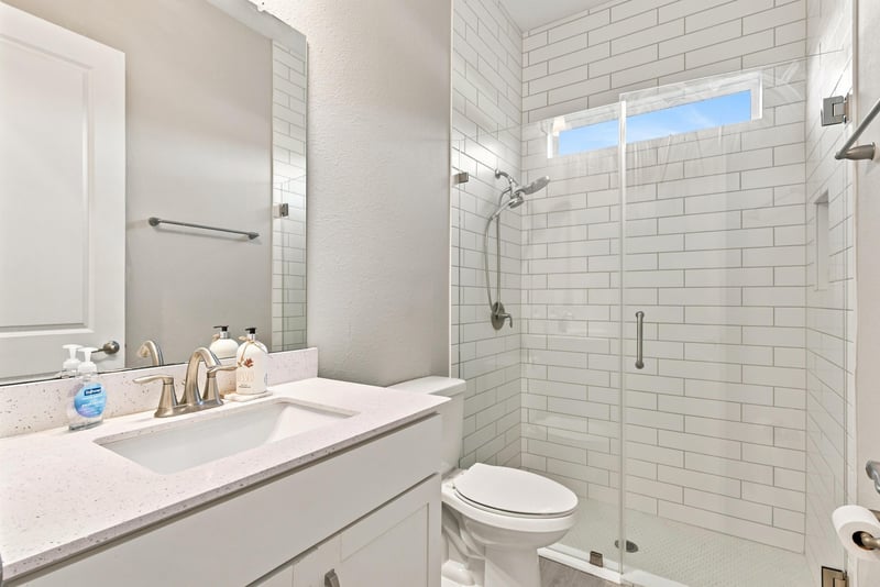 Bathroom with walk-in shower and single vanity at 27 Holly Rdg Wy, St. Augustine, FL