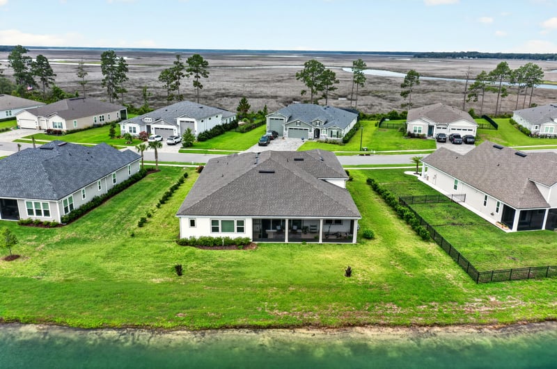 Drone view of the home and marsh in Fernandina Beach, FL