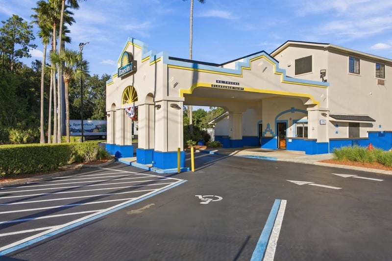 Entrance exterior with flags, photographed by Megapixeler on Eldridge Loop, Orange Park