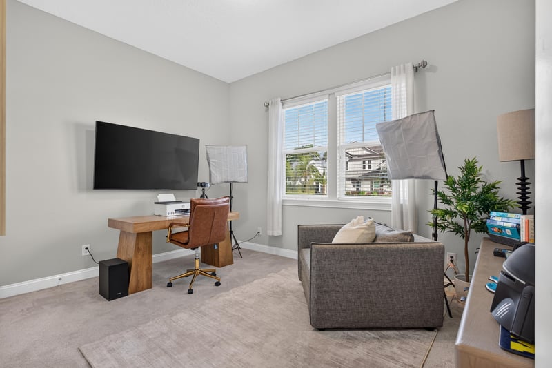 Home office with desk and seating area at 3328 Southern Oaks Dr, Green Cove Springs, FL 32043