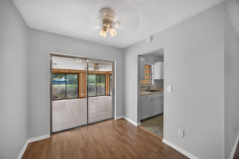 Dining area pass-through opening to the kitchen at 328 Palos Ct, St. Augustine, FL