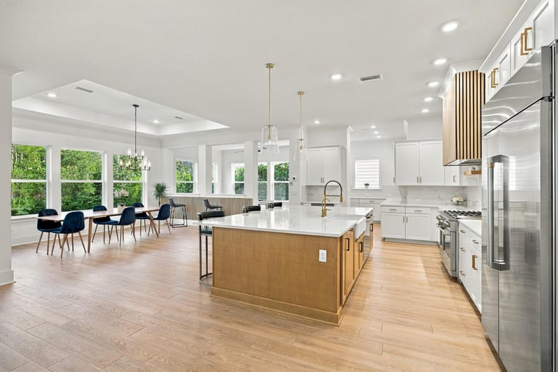 Kitchen and dining area with large island at 907 Seagrove Dr, Ponte Vedra Beach, FL 32081