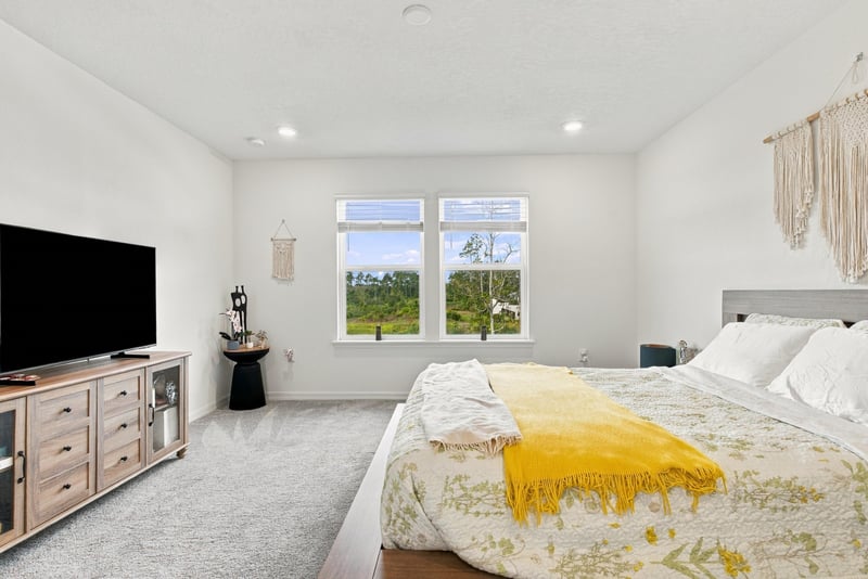 Primary bedroom with dresser and TV, photographed by Megapixeler on Torres Trace, St. Augustine