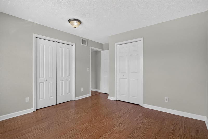 Bedroom with closet doors at 3866 Campenero Ct unit 6, Jacksonville, FL 32217