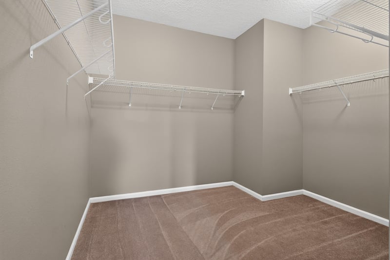 Walk-in closet with wire shelving at 13685 Goodson Pl, Jacksonville, FL 32226