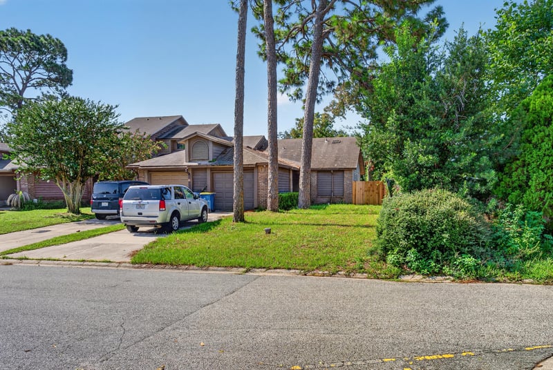 Front yard view toward the street at 8010 International Village Dr, Jacksonville, FL 32277