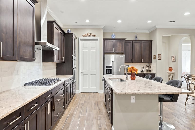 Kitchen view toward pantry, photographed by Megapixeler on Lucena Ln, Jacksonville, FL
