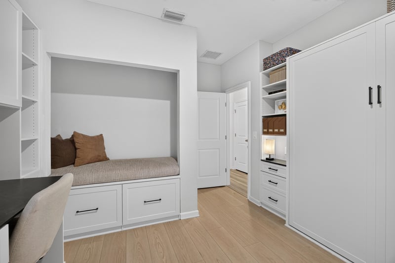 Window seat nook with built-in shelving at 93 Lochloosa Ct, St. Johns, FL 32259
