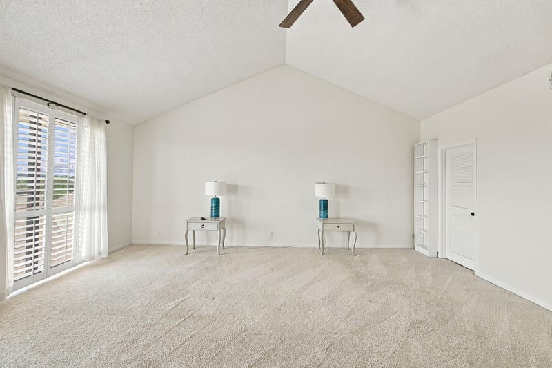 Empty bedroom with ceiling fan and carpet at 752 Spinnakers Reach Dr, Ponte Vedra Beach, FL 32082