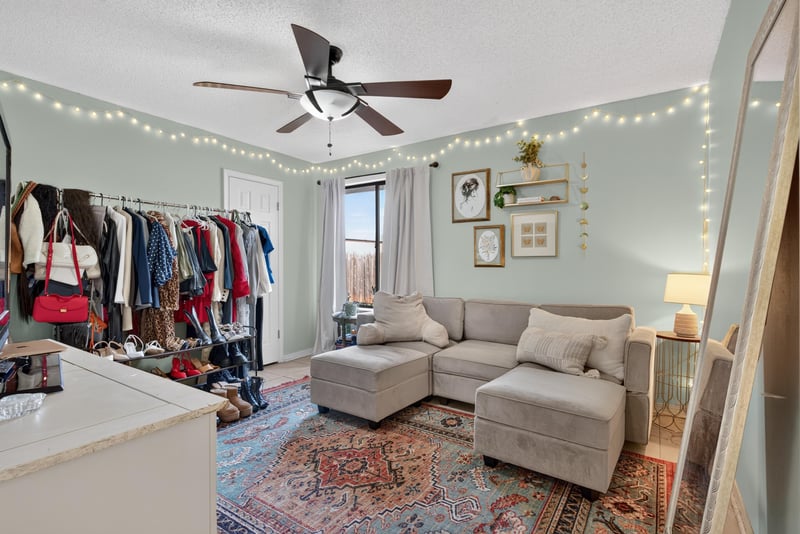 Bedroom used as closet space with string lights at 13020 Medford Ln, Jacksonville, FL 32225