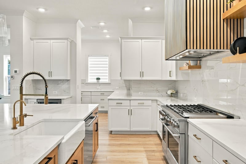 Kitchen detail with range hood and pot filler at 907 Seagrove Dr, Ponte Vedra Beach, FL 32081