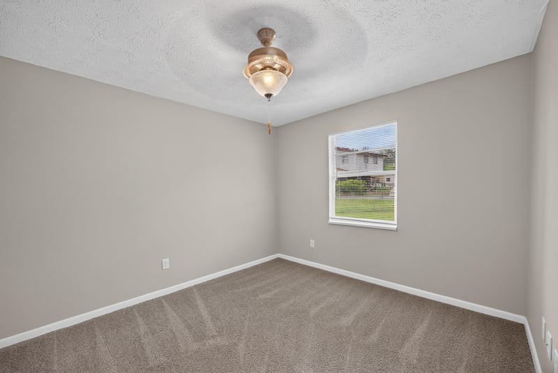 Bedroom with window and carpet at 1143 Tumbleweed Dr, Orange Park, FL 32065