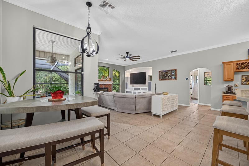 Dining area open to the kitchen at 2125 Blue Heron Cove Dr, Orange Park, FL 32003