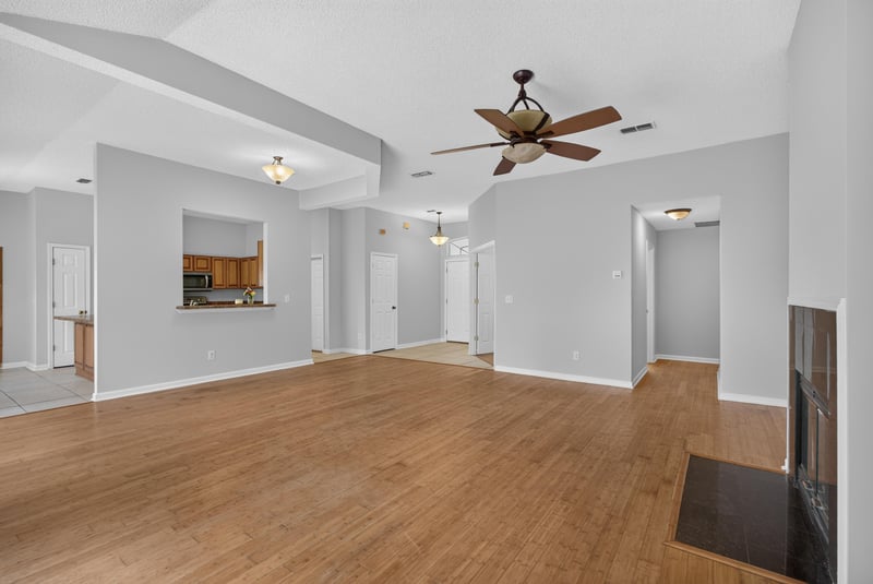Living room view toward kitchen pass-through at 456 Bay Point Way N, Jacksonville, FL 32259