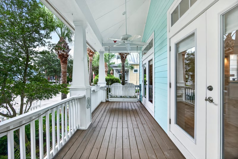 Covered porch walkway with wood decking at 117 Island Cottage Way, St. Augustine, FL 32080
