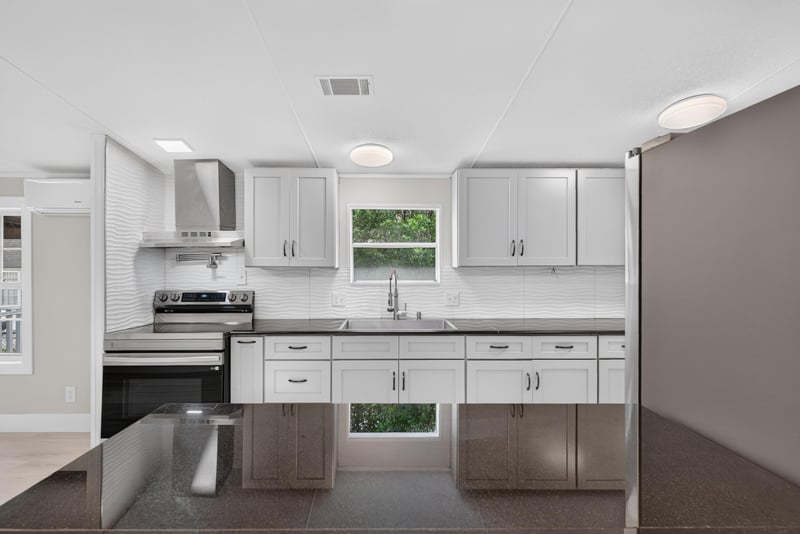 Kitchen range and cabinetry view at 4565 Appleton Ave, Jacksonville, FL