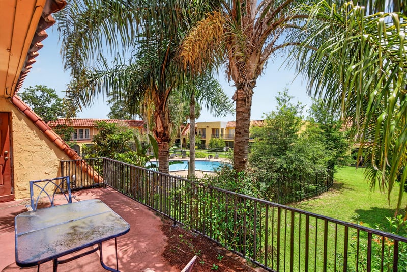 Patio table with view of community pool at 3866 Campenero Ct unit 6, Jacksonville, FL 32217