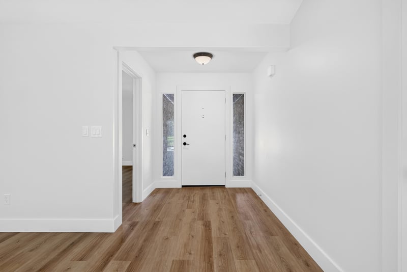 Entry hallway leading to front door at 8453 Boysenberry Ln W, Jacksonville, FL