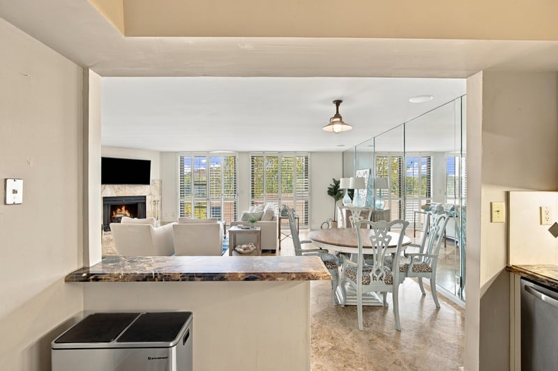 Kitchen pass-through to dining and living area at 752 Spinnakers Reach Dr, Ponte Vedra Beach, FL 32082