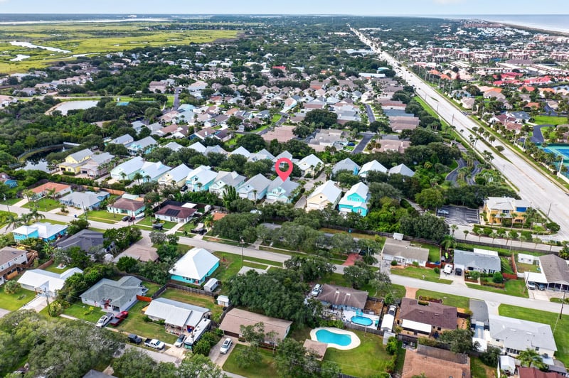 Wide aerial view of the neighborhood and coastline in St. Augustine, FL