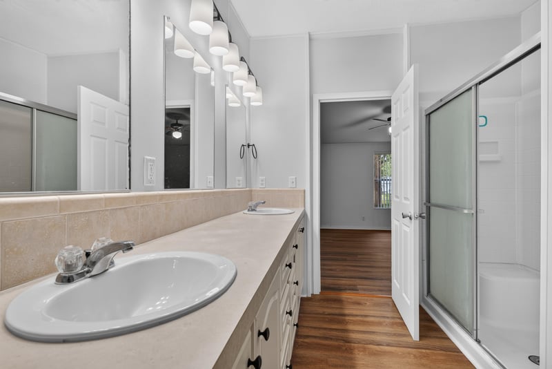 Primary bathroom with vanity and separate shower at 3215 Robin Ln, Middleburg, FL