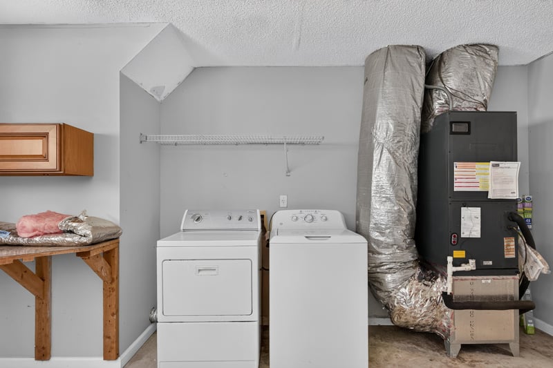 Laundry room with washer, dryer and water heater at 456 Bay Point Way N, Jacksonville, FL 32259