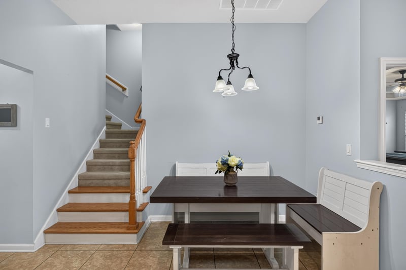 Breakfast nook with bench seating near staircase at 3112 Silverado Cir, Green Cove Springs, FL 32043