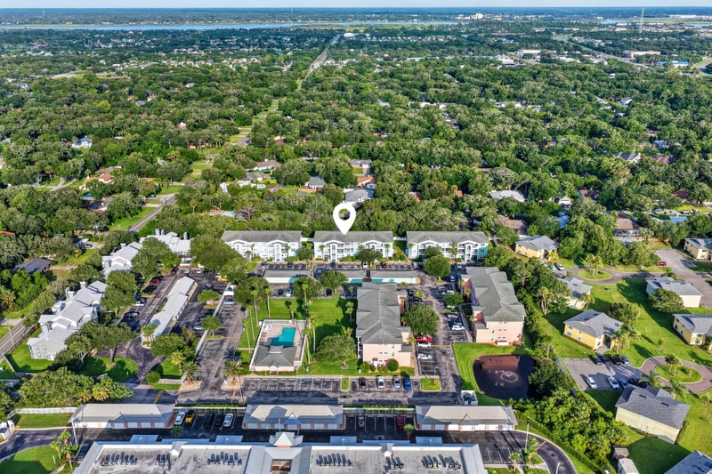 Aerial view of tree-covered neighborhood streets in St. Augustine, FL