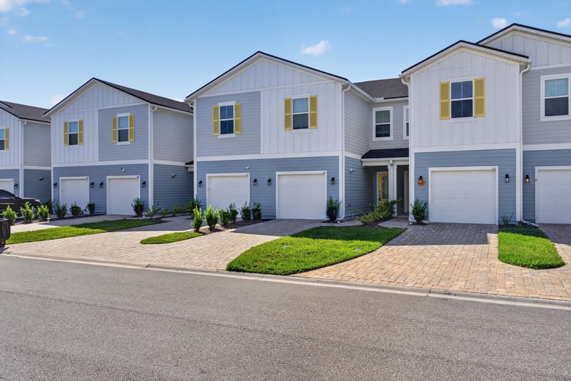 Front exterior, paired garage and driveway at 39 Mellowood Ln, St. Augustine, FL 32092